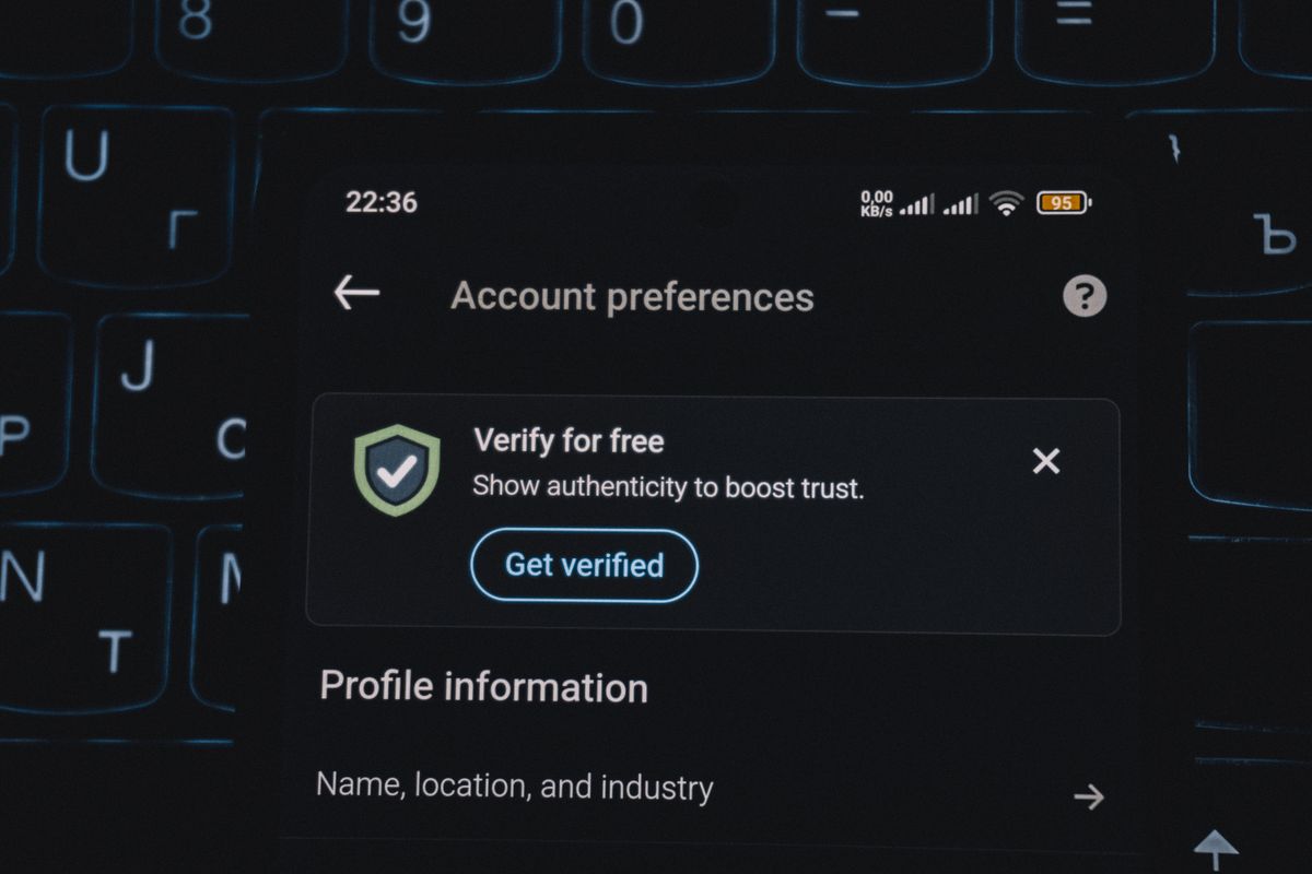 A smartphone screen showing an account verification alert