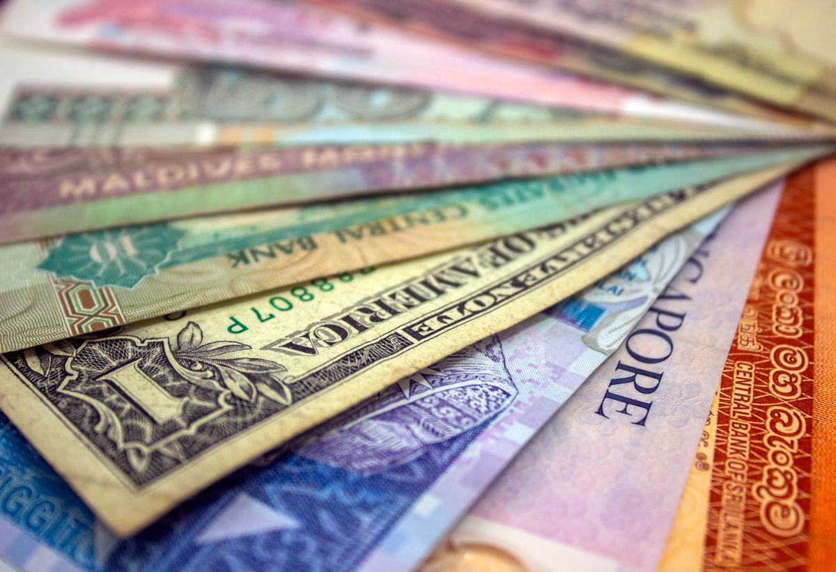 Close-up of various international banknotes and currencies
