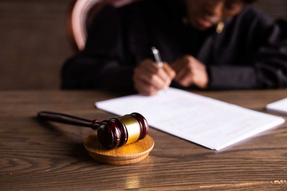 Gavel and legal documents on a desk, representing Papua New Guinea's gambling laws