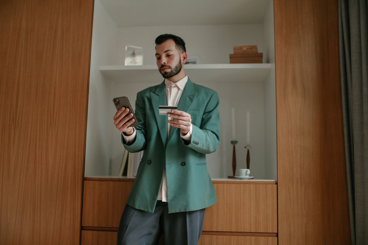Person checking a mobile banking balance on a smartphone