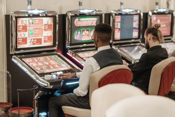 Players at slot machines