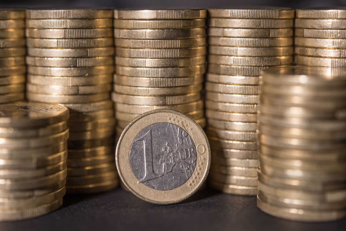 Stacked coins shown in close-up macro detail